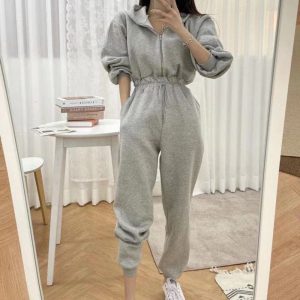 Combinaison pyjama polaire à capuche pour femme