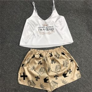 Pyjama haut à bretelles blanc et short doré pour femme