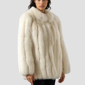 Veste longue en fourrure beige